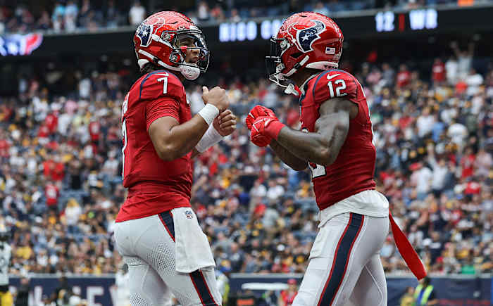 Houston Texans quarterback C.J. Stroud (7) and wide receiver Nico Collins (12) celebrate after a touchdown against the Pittsburgh Steelers at NRG Stadium Sunday. The Texans won 30-6.